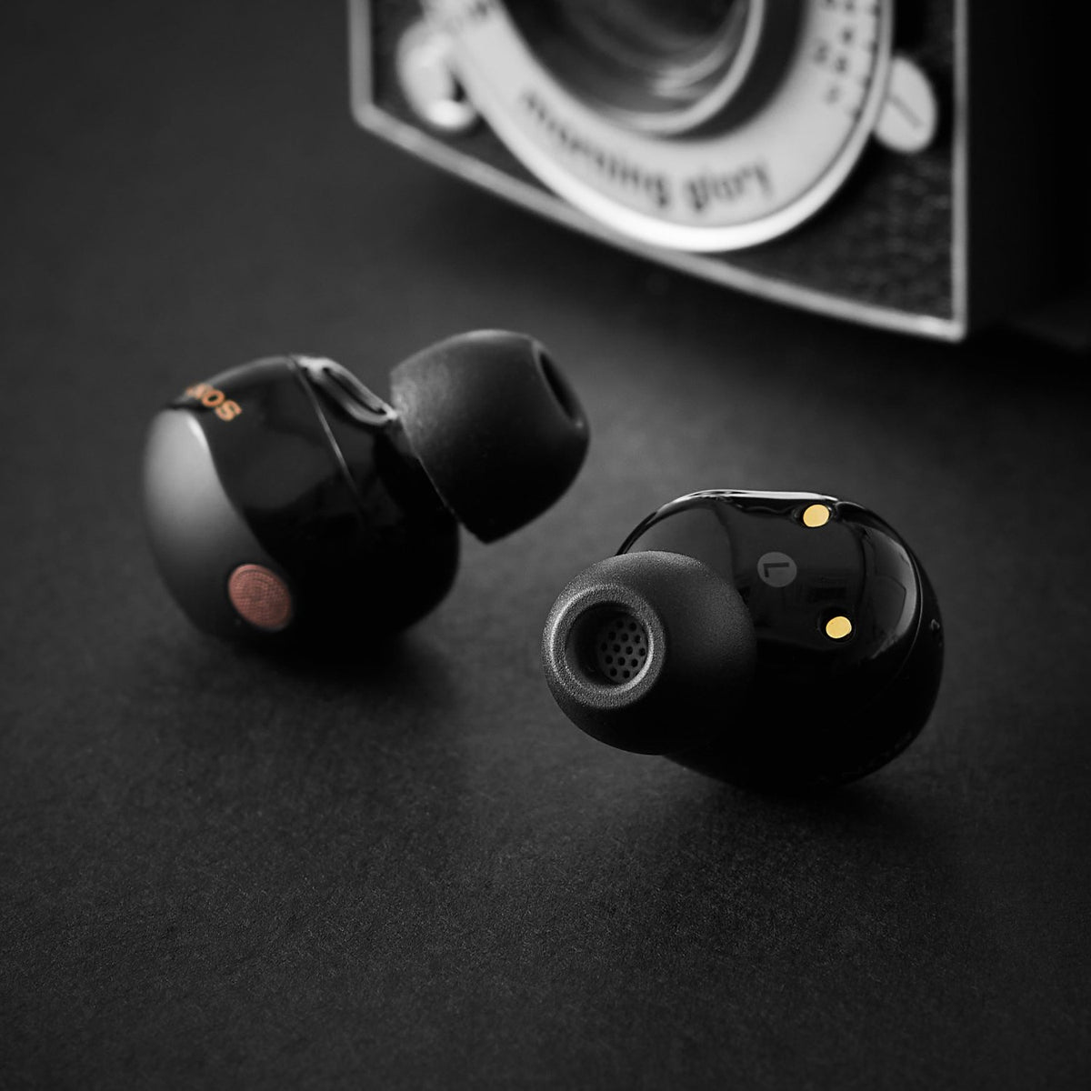 AZLA SednaEarfit Foamax fitted on a pair of black wireless earbuds