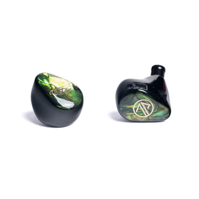 7th Acoustics Supernova earpieces from the front, showing the abalone shell inlay