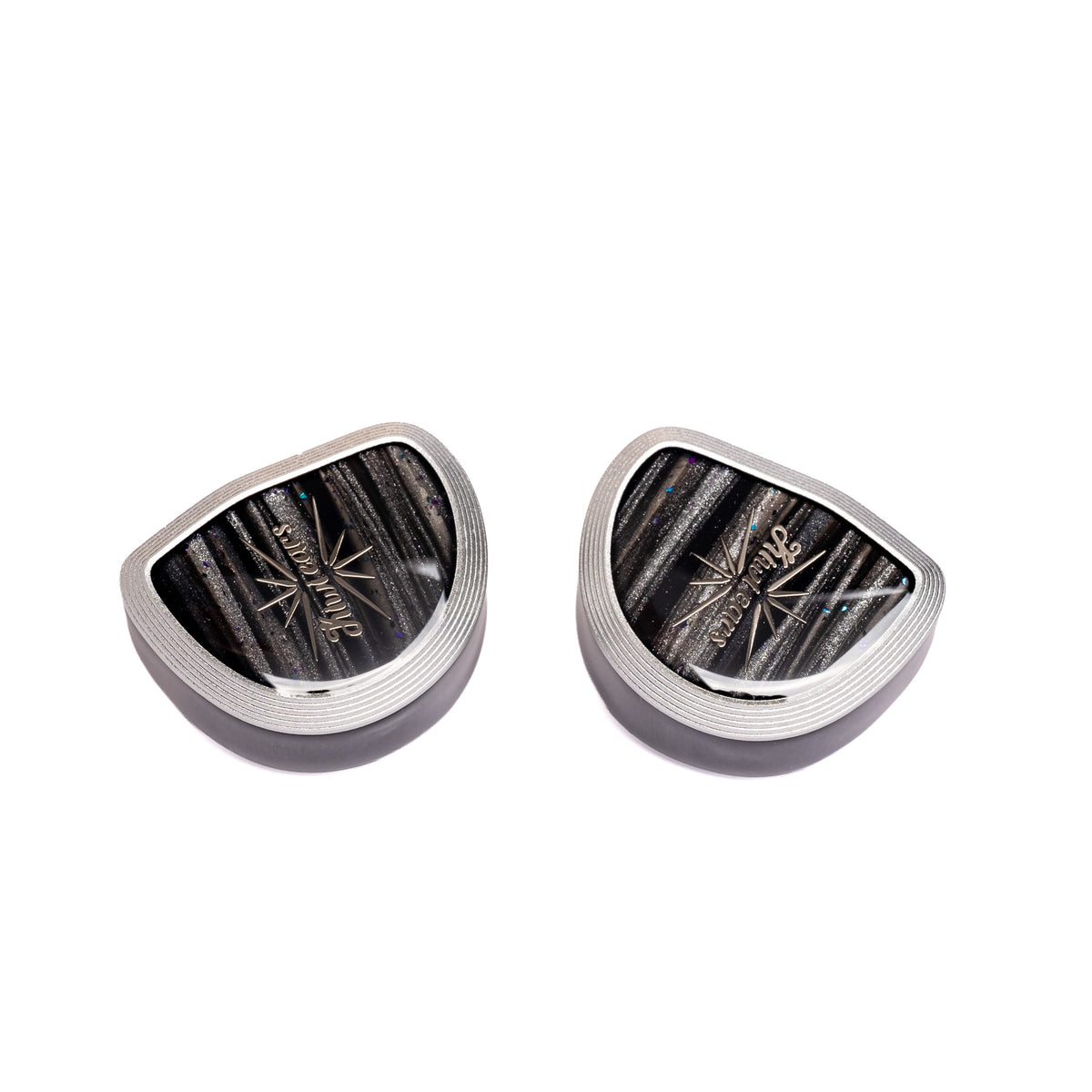 Kiwi Ears Aether shells at an angle, silver metal frames around striped faceplates with Kiwi Ears logo