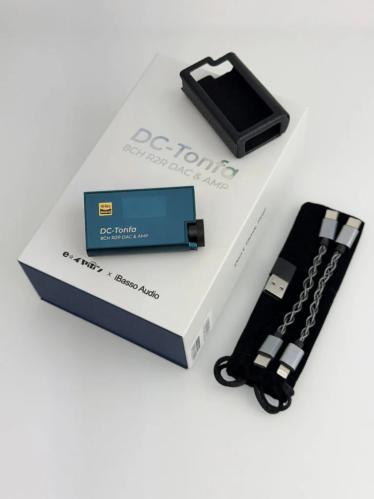 iBasso DC-Tonfa box contents laid out: dongle, box, black protective case and braided cables in a black pouch